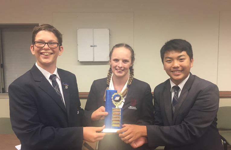 William Poley, Kimberley Osborne and Brian Tang with their COWs trophy. 