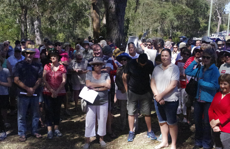 Hundreds gather to protest development on Mambo Wanda Wetlands. Photos by Marian Sampson