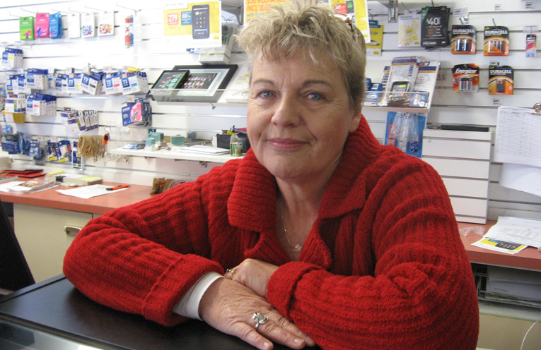 Newsagent Julie Fitzgerald with that winning smile.
