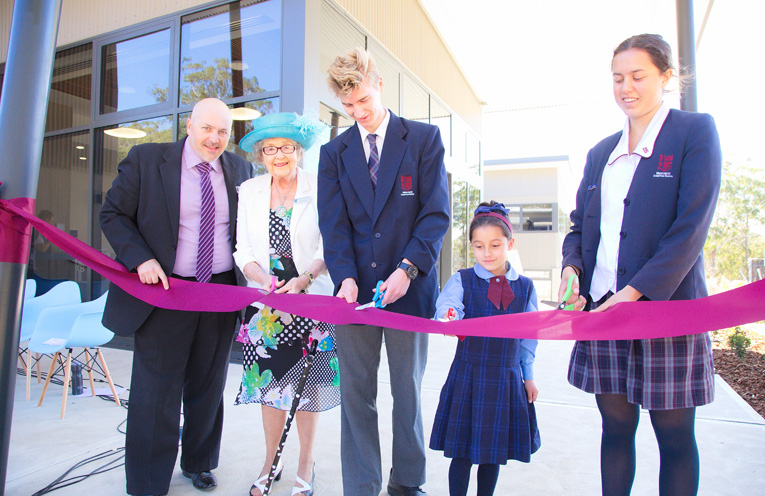 The official ribbon cutting by Mr Simon Herd, Mrs Maureen (Nanna) Cole, Tiarna Bezuidenhout (kinder student), Joshua Archer and Kathleen Churchill (school captains) Photos by Pete Neville