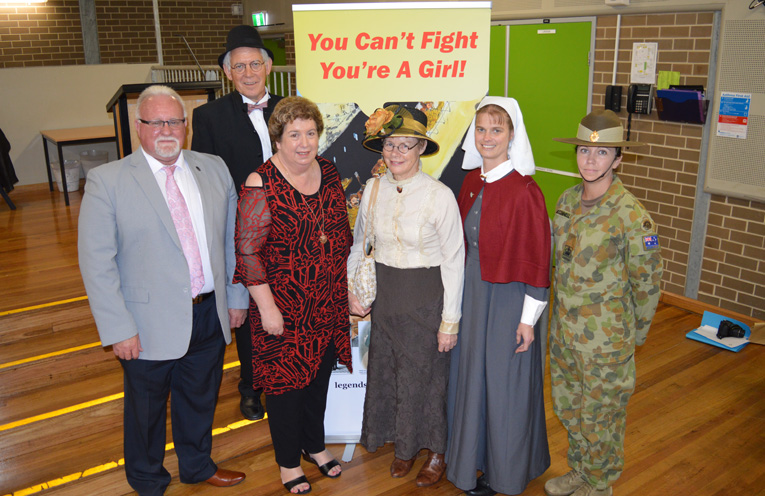 Authors John Gillam and Yvonne Fletcher with organisers of the King Street Festival, Kaye Newton and Peter Robinson alongside Mrs Renae Jenkins dressed as a World War I nurse in authentic replica uniform, and WO2 Kristy McConnell from 8 Combat Service Support Battalion based at Adamstown.