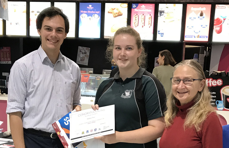 Councillor Giacomo Arnott awarding students at this week’s PBL awards at the MarketPlace.