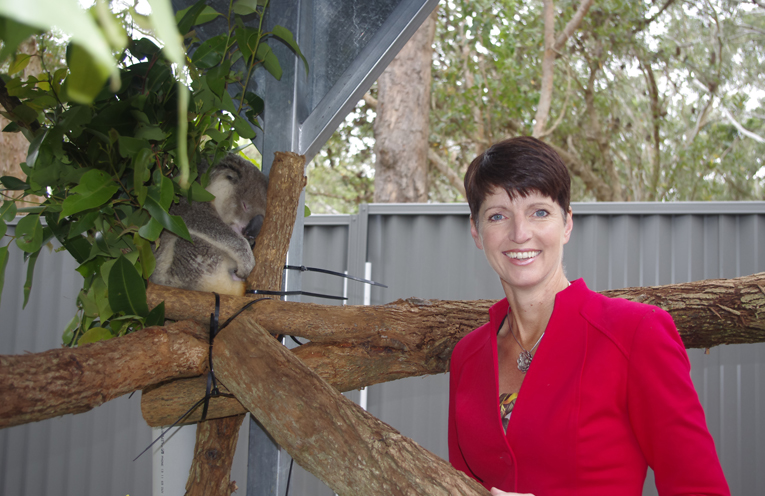 Kate Washington with Tolley at the Port Stephens Koala Sanctuary. Photo by Marian Sampson.