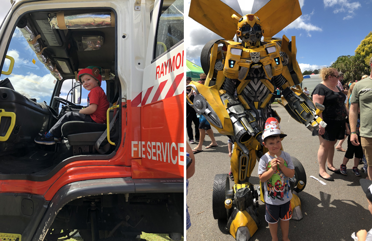 Owen Brown checks out the fire engine cabin. (left) Bumblebee the Transformer was a hit with everyone. (right)