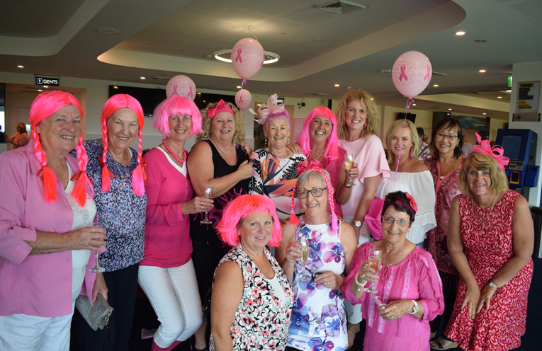 A Group of the ladies who got right into the pink spirit for the fundraiser.