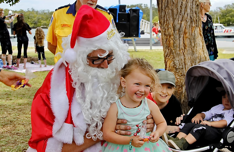 Santa brought lollies for all the children visiting the Festival.