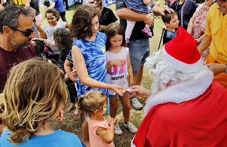 Santa brought lollies for all the children visiting the Festival.