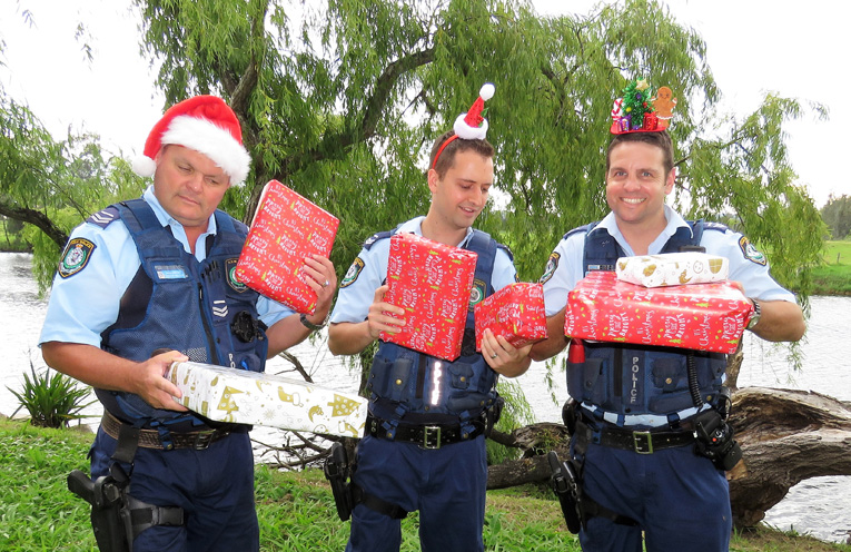 Sn Constables Trevor McLeod, Dave Feeney and Ash Ray share the joy of Christmas. 