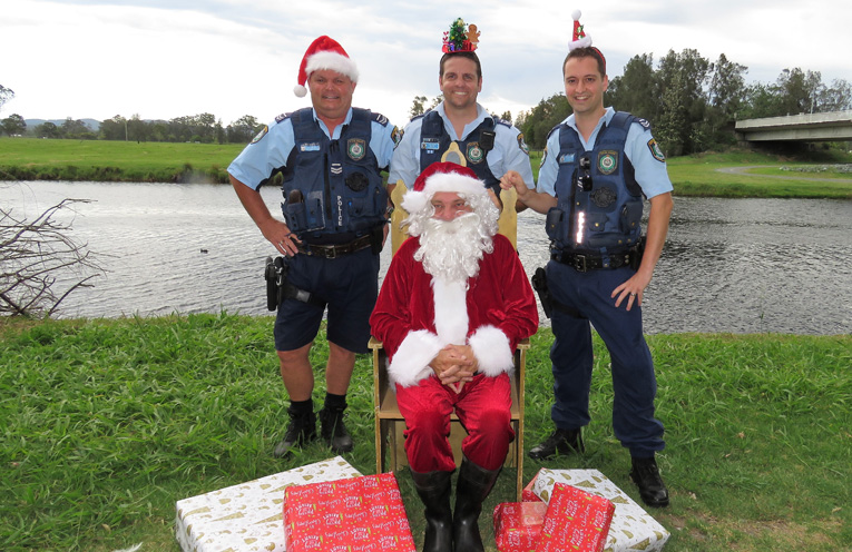 Tis The Season: Sn Constables Trevor McLeod, Ash Ray and Dave Feeney with Santa. 