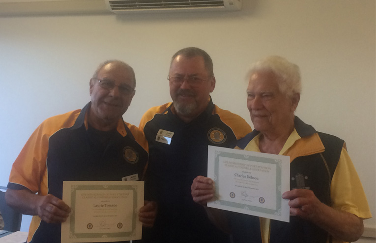 Life Member Laurie Toscano, Club President Laurie Nolan and Life Member Charles Dobson with their certificates of life membership.