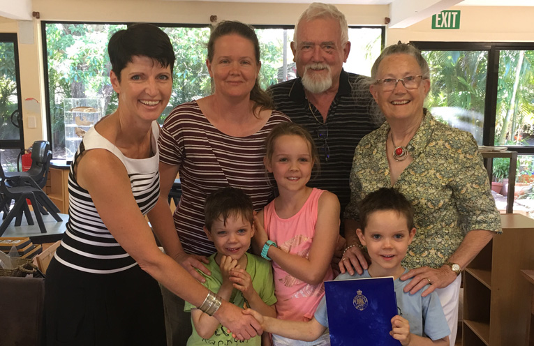 Kate Washington MP presenting Luke with his winning certificate, joined by Luke’s mum Madeleine, grandparents Jacqui and Derek, and siblings Caleb and Stephanie.