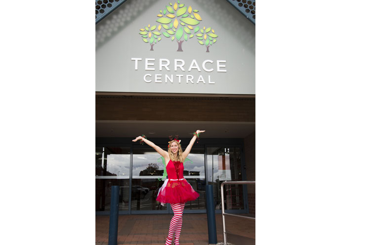 Bec ‘Elf’ Kozis out front of Terrace Central, which is set for a makeover, starting with a Christmas Extravaganza.