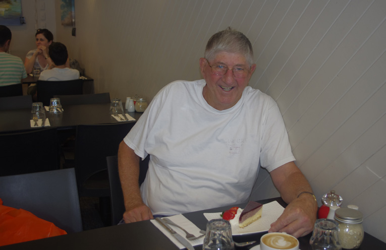 Local Don Mayo enjoying coffee and cake for morning tea while he was out buying a new shirt. Photo by Marian Sampson.