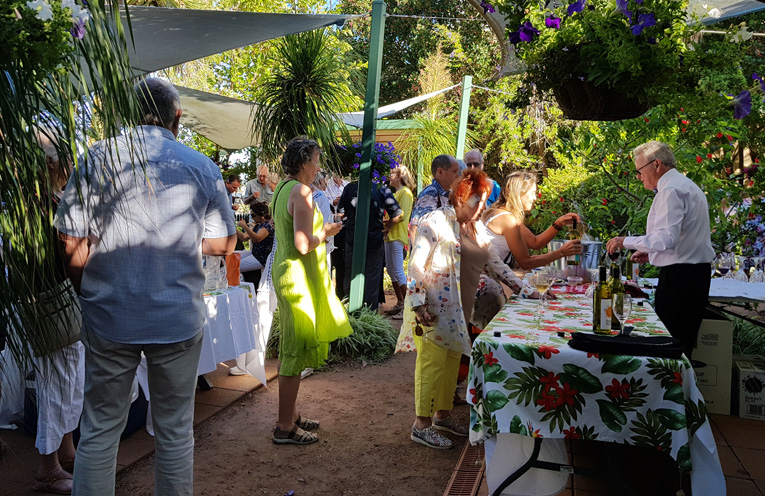 GRAND OPENING: Champagne and canapes in the Garden.