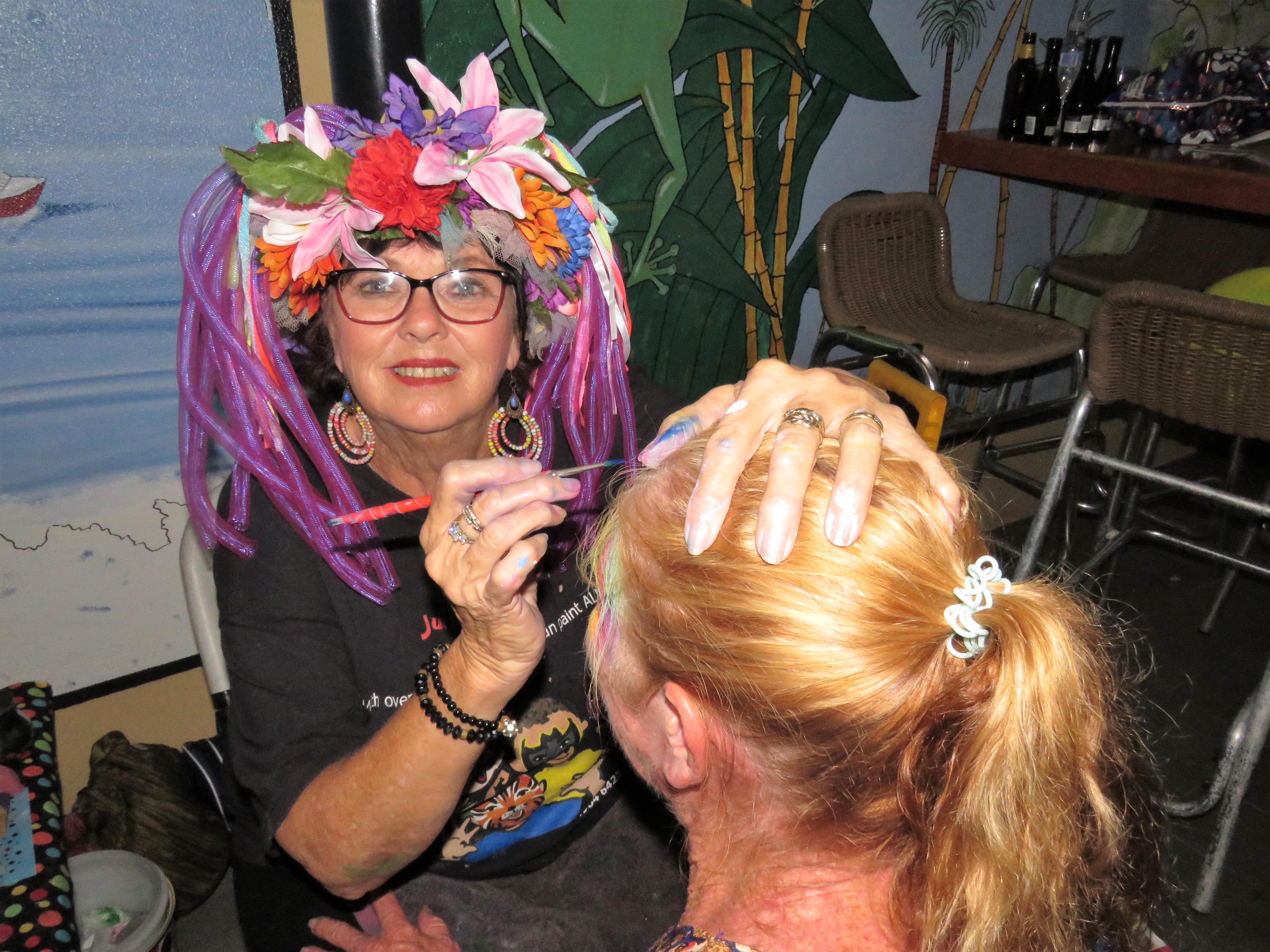 Face painter Judy Walker was kept busy at Tea Gardens Country Club.