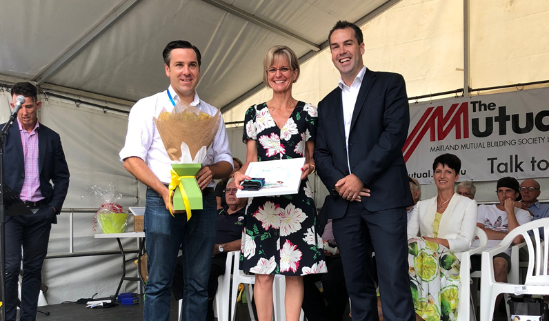 Colleen Mulholland-Ruiz being presented with her award by Mayor Ryan Palmer and Australia Day Ambassador Peter McLean. 