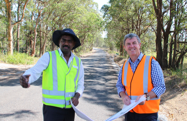 Mid Coast Council’s Senior Asset Engineer Gamini Weththasinghe inspects the works with Federal Member for Lyne Dr David Gillespie.