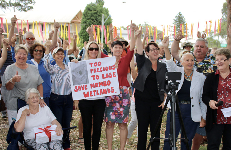 1.Kate Washington (centre in red) flanked right by Penny Sharpe NSW Shadow Environment Minister, Wetcon’s Irene Jones and Kathy Brown. Pictured to her left is Wetcon ‘footsoldier’ Emma Bowen and they are circled by SAVE MAMBO supporters. Photo by Willem Van Zanten.