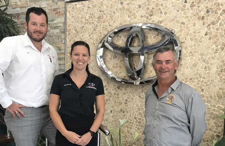 Josh Walker and Michelle Smith from Port Stephens Toyota, with Medowie Rugby President Dwayne Murphy. 
