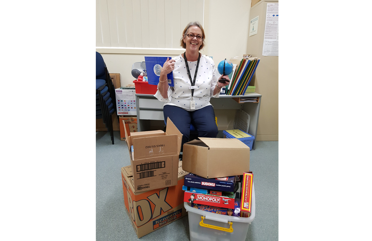 DE-CLUTTER WORKSHOP: Librarian Chris Shelly.