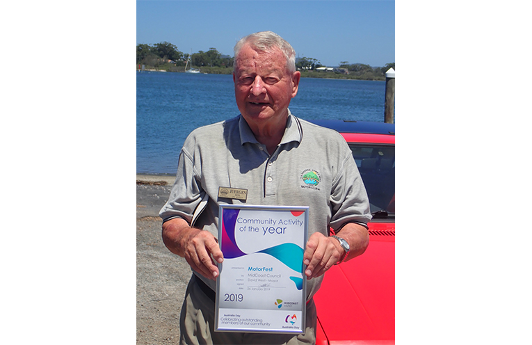 Juergen Seil with the Community Activity of the Year Award.