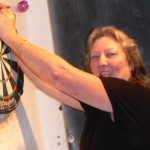 Lyn Pearson showing how to play darts