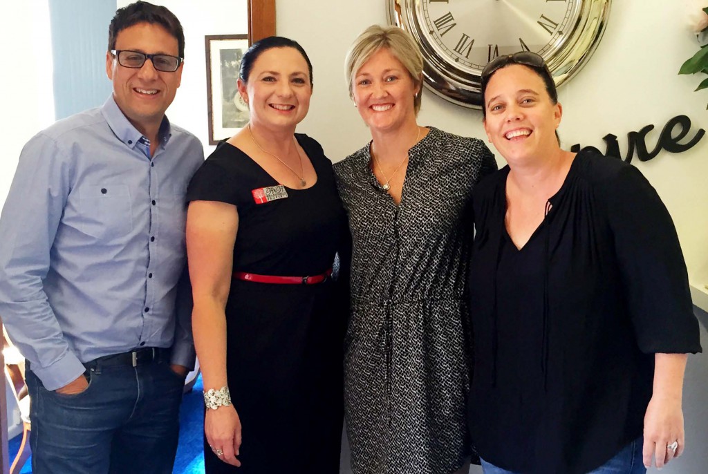 Property expert Andrew Winter, Managing Director of R and R Property Denise Haynes with the happy vendors, Arianna and Melissa.