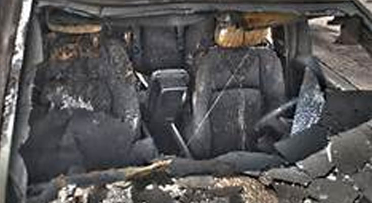 Burned remains of a car after being set on fire 