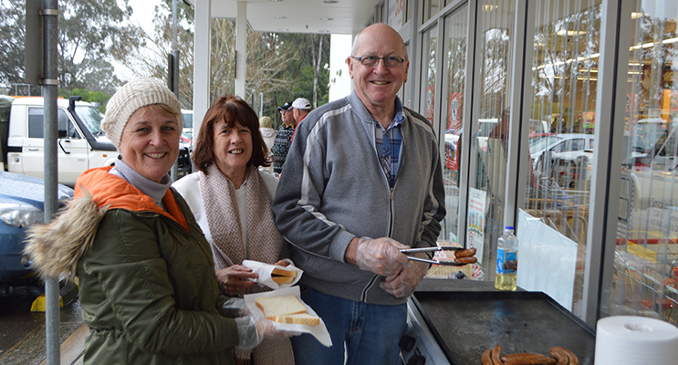 Volunteers Julie Williams, and David Brown with local supporter Marilyn Willoughby in the middle.