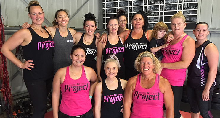 The smiling faces of Project Health and Fitness – fundraising for the cause!