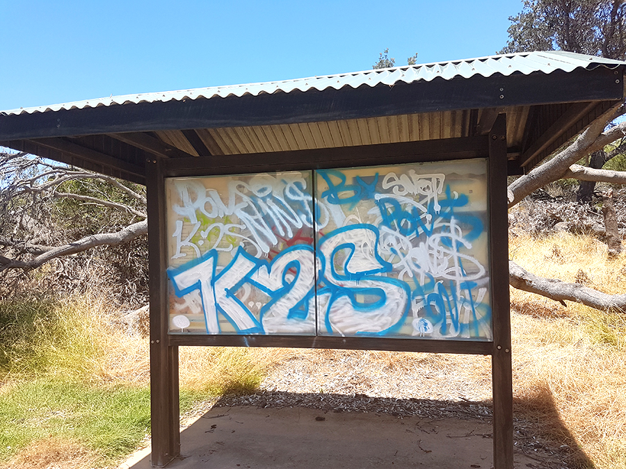 .Information shelter graffitied.