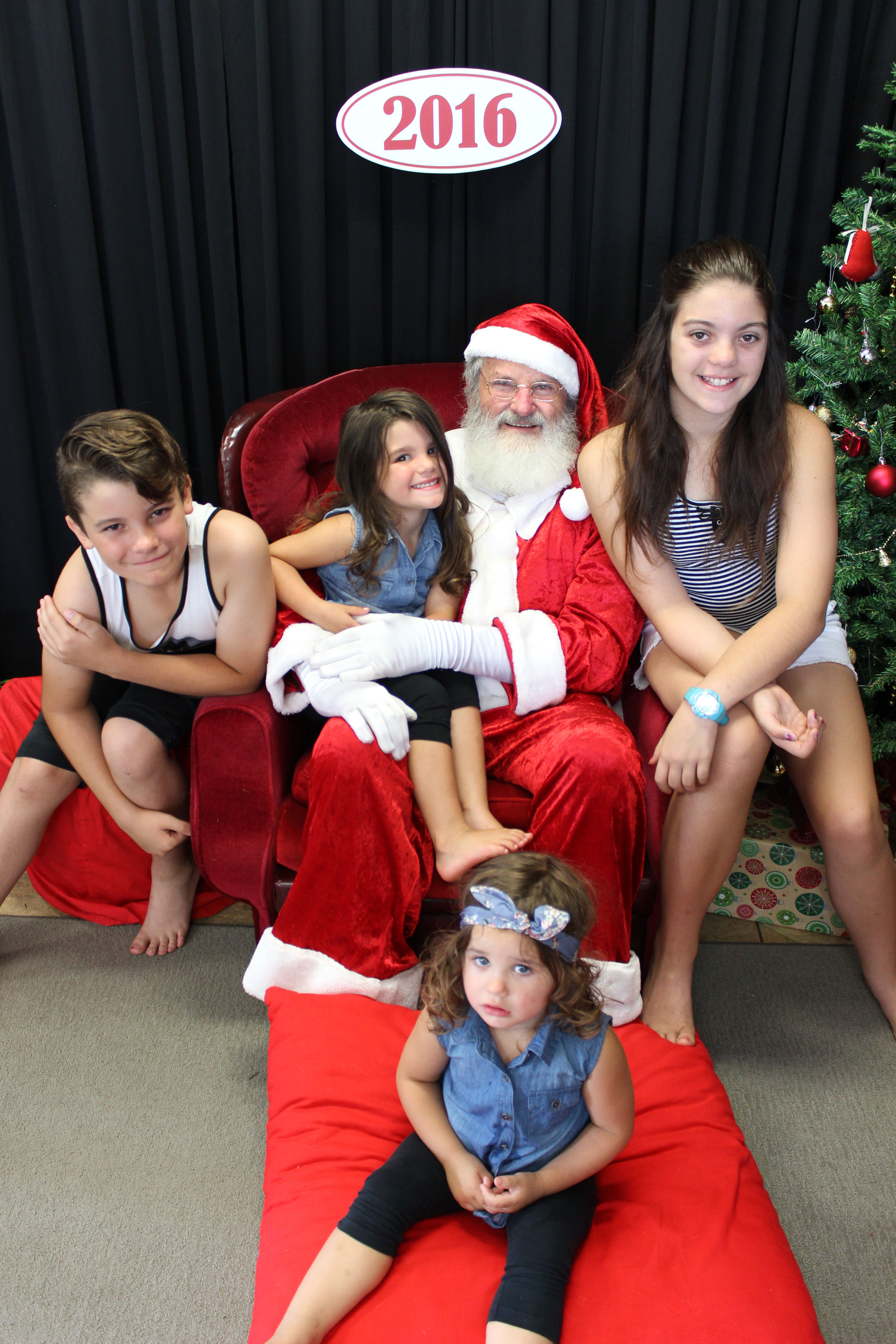 The Norris Family strike a pose with Santa. Photo supplied by Aaron McGowan