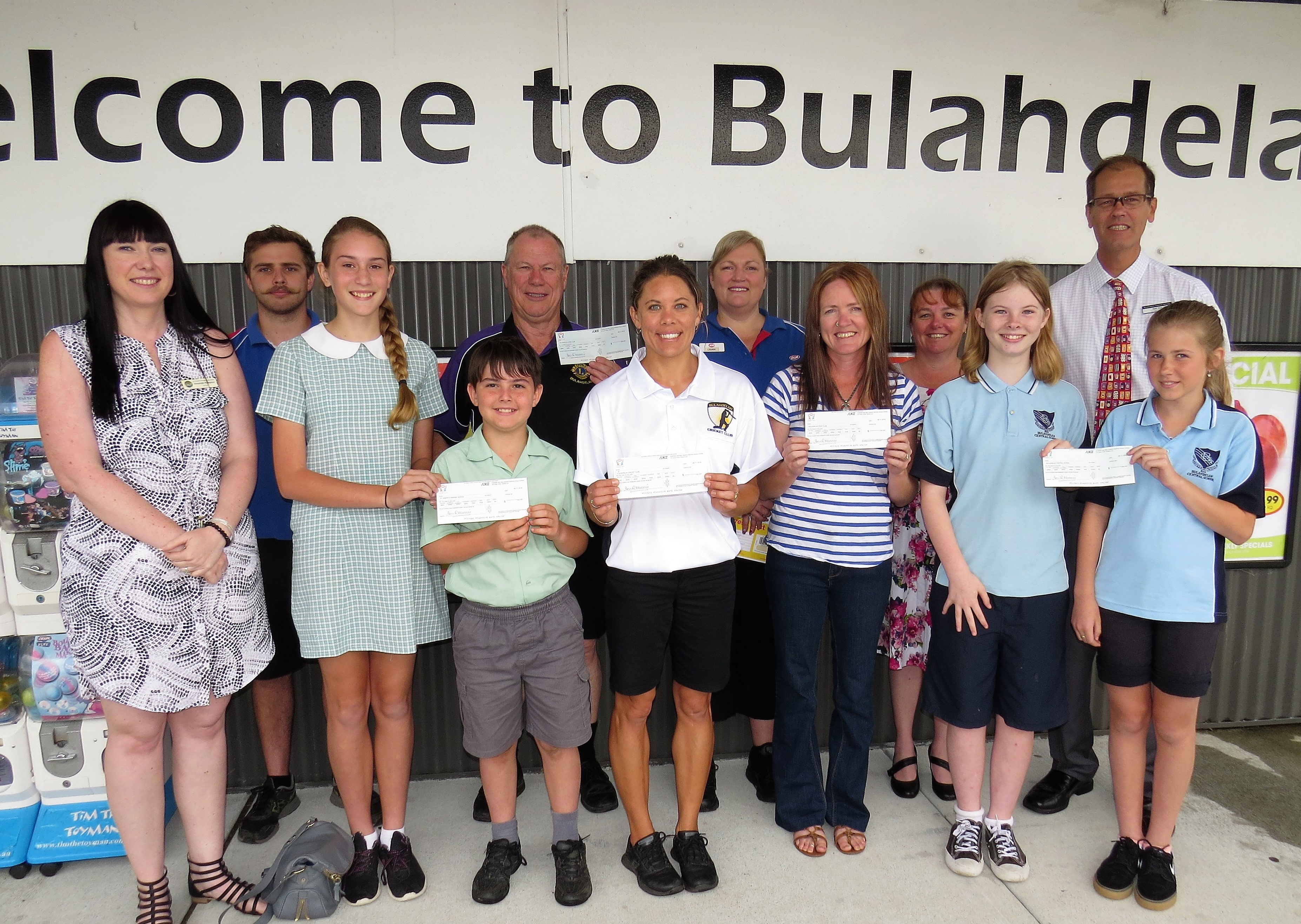 WITH THANKS: St Joseph’s Amanda Pomplun, IGA’s Tom Weippeart, students Seren Everingham and Connor Baker, Lions President Roger Dixon, Cricket Club’s Erin Matheson, IGA Supervisor Louise Dorney, Pony Club President Alicia Madden with Deb Gilbert, Rod Pye, Claire Terry and Olivia Smith from BCS