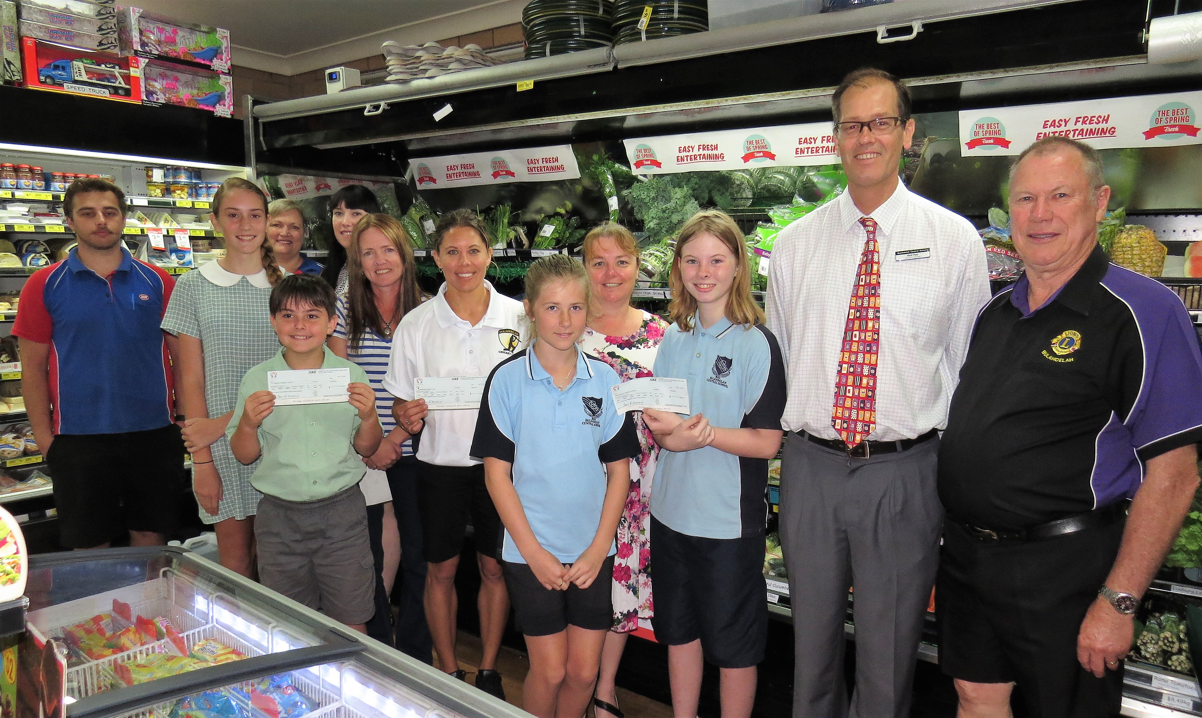 WITH THANKS: IGA’s Tom Weippeart, St Joseph’s students Seren Everingham and Connor Baker, IGA Supervisor Louise Dorney, Teacher Amanda Pomplun, Pony Club’s Alicia Madden, Cricket Club’s Erin Matheson, Olivia Smith, Deb Gilbert, Claire Terry and Rod Pye from BCS and Lions Club President Roger Dixon