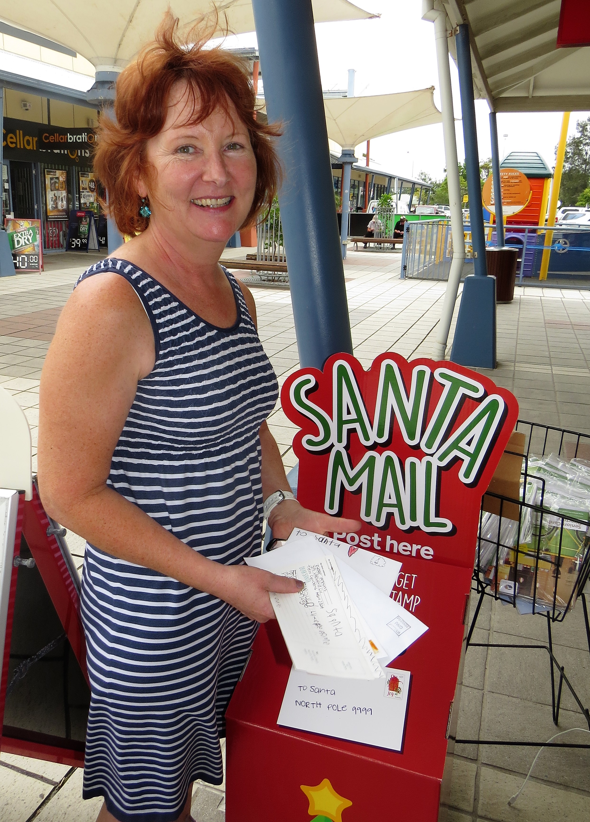 CHRISTMAS MAIL: Tea Gardens Post Office Manager Monica Back collects the mail for Santa