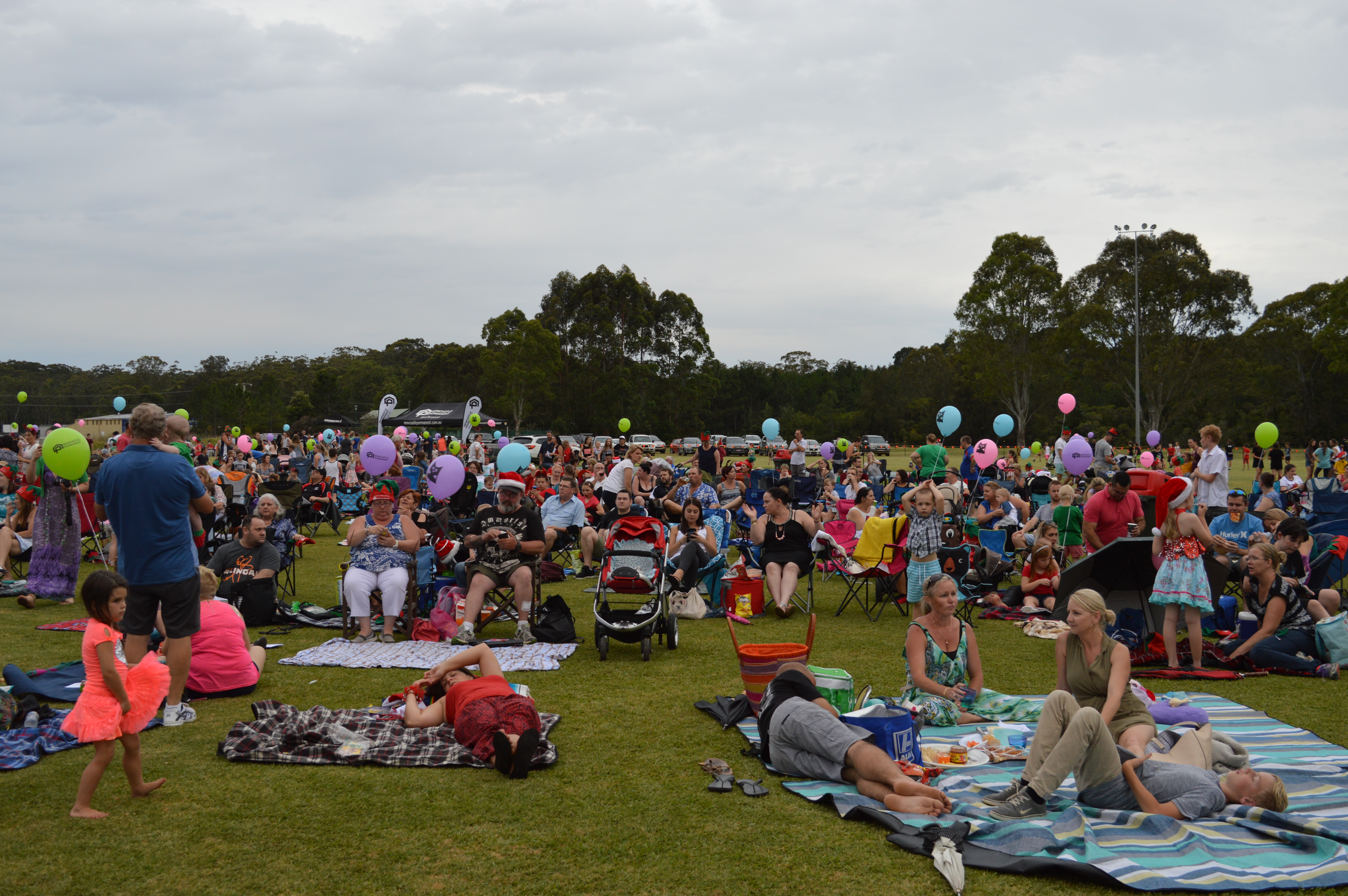 Crowds gather and sing at the Medowie Christmas Carols.