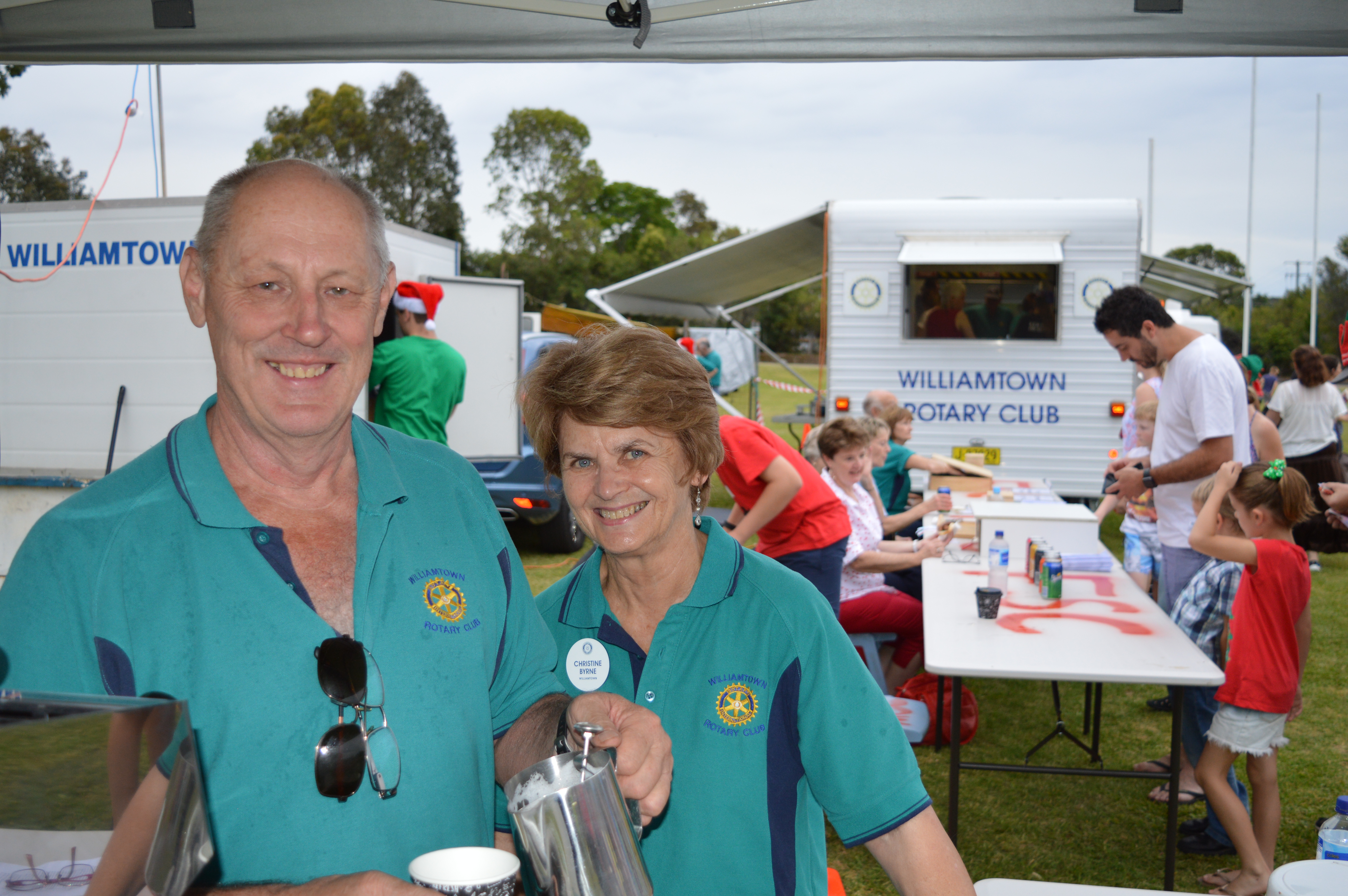 Rotary Club volunteers serving tea and coffee, Steve Merritt and Christine Byrne.