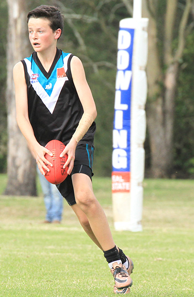 Ethan Hayes, 8, Port Power player. He played his first year in 2016 and won the Under 13s Best and Fairest Player. 