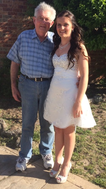 Before the accident: Brian Faust with granddaughter Hannah Ogilvie. Photo supplied by family