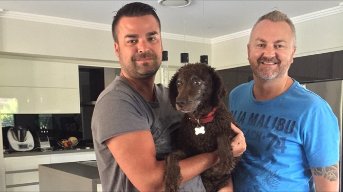 Dean Compton and Nathan Wilson, with their surviving dog Charlotte.