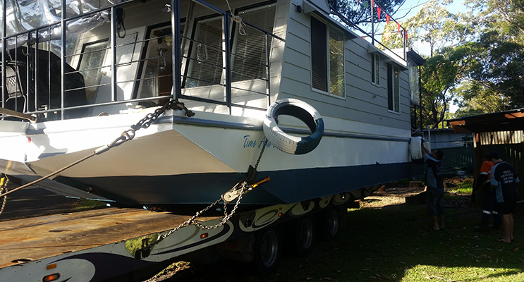 HOUSEBOAT TALE: ‘Time and Money’ leaves front yard.