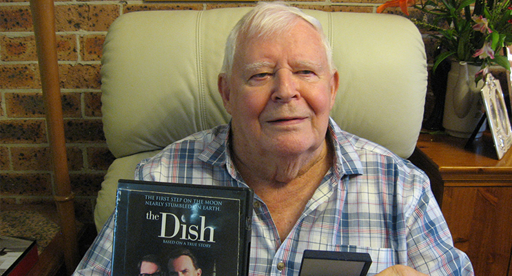 Les with 'The Dish' DVD and his treasured medallion.