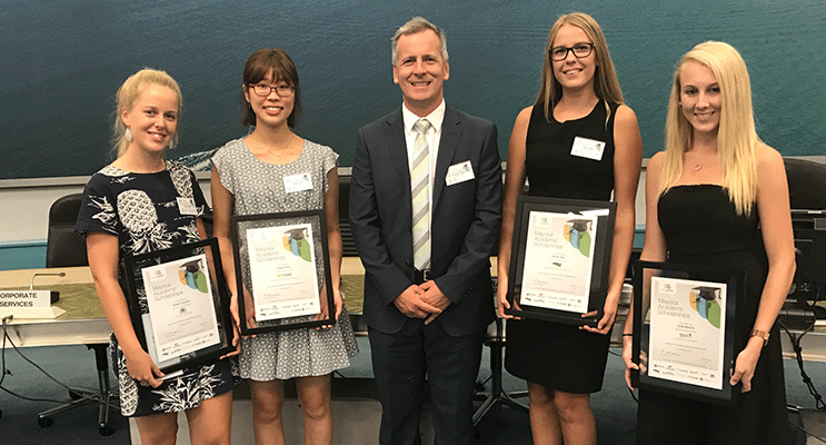 Scholarship recipients Grace Kim, Grace Gayden, Julia Macris and Sarah Bell with St Philip’s Principal Tim Petterson on the awards night. Photo supplied 