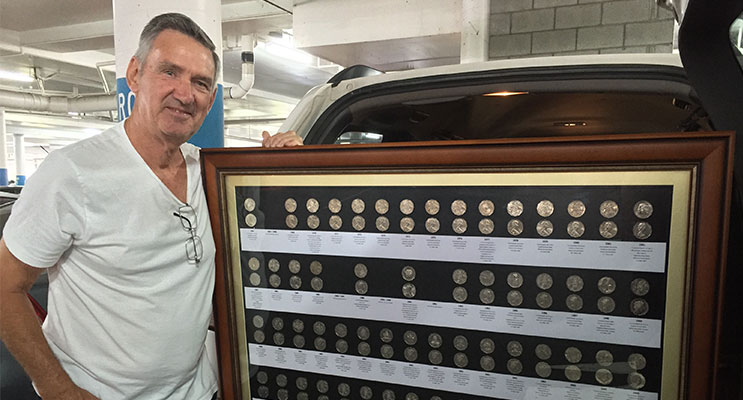 Medowie’s keenest coin collector, Lex Van Huisstede, with his impressive display of 50 years of 50 cent coins. 