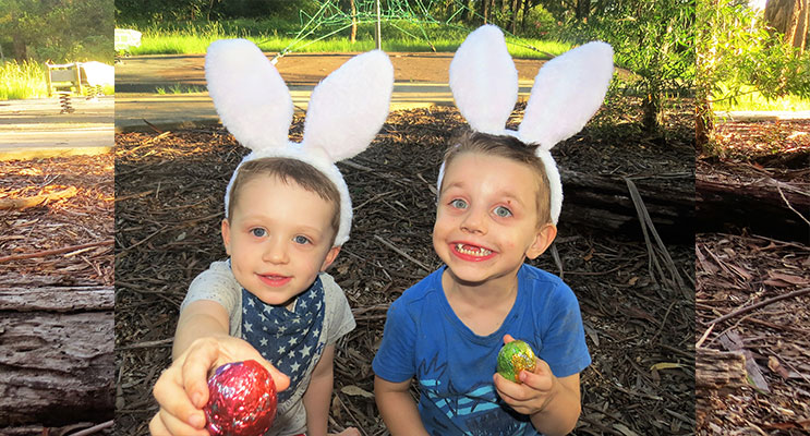 Easter Egg Hunt: Nathan and Ethan Swann collect eggs left by the Easter Bunny.