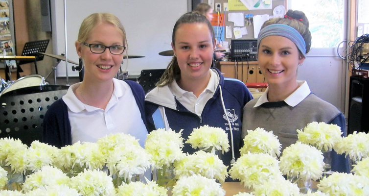 Mother’s Day Flowers: BCS Year 12 students Kaitlyn Gregory, Shae Finch and Bianca Mason.