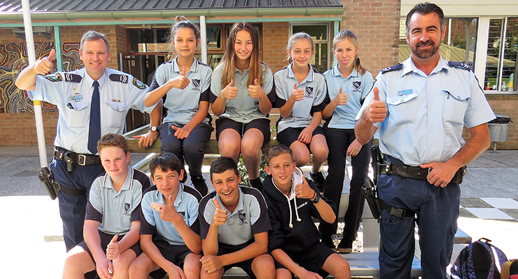 Mid North Coast School Liaison Officer Senior Constable Stephen Jefferies and Manning Great Lakes School Liaison Officer Senior Constable David Russell with BCS Year 7 students. 