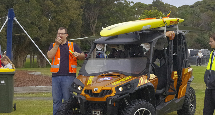 Danny Eather from Destination Port Stephens with the Fingal Bay Beach Rescue Vehicle.