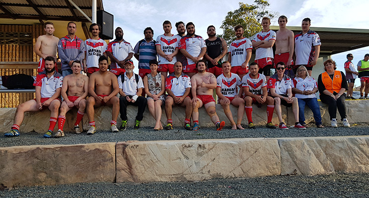 KARUAH SPORTS OVAL: Kate Washington MP front and centre with the Karuah Roos Rugby League Team.